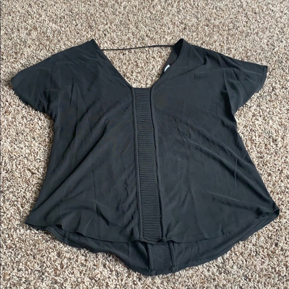 Black shirt with pattern down middle